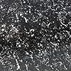 black and white photograph of snow flakes in the air with no clouds on it