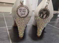 the shoes are decorated with an image of a man in a tuxedo and pearls