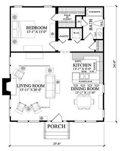 the floor plan for a two story house with an open kitchen and living room area