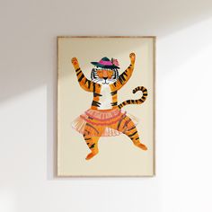 a tiger wearing a tutu is hanging on the wall