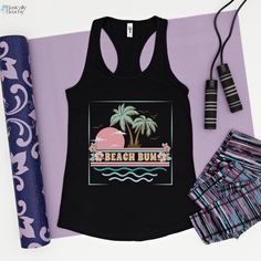 Beach Bum, Tropical Sunset and Palm Tree vintage style racerback workout or casual tank top. The model in the black tank top on the beach is 5'4'' 140lbs and is wearing a size L for a relaxed fit. Slim Fit Next Level Racerback tank-top (sizing chart in images) Material: 60% combed, ring-spun cotton, 40% polyester Extra light fabric (4 oz/yd² (135 g/m²)) Slim fit Runs slightly small since it is a slim fit. I suggest ordering one size up if you prefer a looser fit in your tank tops. Average Proces Tropical Sunset, Workout Tank Top, Black Tank Top, Casual Tank Tops, Beach Bum, Workout Tanks, Black Tank, Racerback Tank Top, Sizing Chart