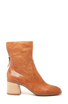 A chunky stacked heel brings earthy texture and just-right height to a versatile boot that you'll want to wear everywhere. 2 1/4" heel 6 1/2" shaft Back zip closure Memory foam cushioning Leather upper/textile lining/synthetic and rubber sole Imported Women's Shoes