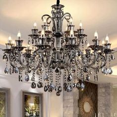 a fancy chandelier hangs from the ceiling