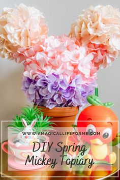 a vase filled with flowers sitting on top of a table