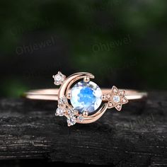 "This is a round 5mm natural moonstone engagement ring in solid gold, The accent stones are diamonds or moissanites. The band width is about 1.4mm. It can be made in any ring size. However please contact me to custom make it to a special big or small size. It can be made in white gold,rose gold or yellow gold with 14k or 18k. However for some people who are nickel allergic,I can also make it to 925 sterling silver to make you can wear it. The ring is handmade,very high quality! 30 days money bac Moonstone Ring Vintage, Moon Engagement Ring, Cluster Diamond Ring, Wedding Ring Women, Ring Rosegold, Moissanite Wedding Ring, Moonstone Engagement, Rose Gold Diamond Ring, Moonstone Engagement Ring