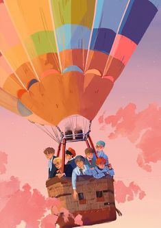 a group of people riding on top of a hot air balloon