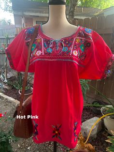 "Blouse STYLE DETAILS Overview * soft cotton fabric * round-neck * hand embroidered design * short sleeves * mid thigh Fit & sizing Red: 37\" Bust (all around) 33\" Long Beige: 38\" Bust (all around) 33\" Long Black 1: 38\" Bust (all around) 33\" Long Black 2: 38\" Bust (all around) 33\" Long Magenta: 34\" Bust (all around) 29\" Long Green: 38\" Bust (all around) 33\" Long Purple: 37\" Bust (all around) 33\" Long Hot Pink: 36\" Bust (all around) 28\" Long Yellow: 39\" Bust (all around) 33\" Summer Short Sleeve Embroidered Dress, Summer Embroidered Dress With Short Sleeves, Fitted Embroidered Short Sleeve Top, Fitted Embroidered Top With Short Sleeves, Spring Short Sleeve Blouse With Tonal Embroidery, Red Bohemian Crew Neck Blouse, Fitted Short Sleeve Embroidered Top, Fitted Short Sleeve Top With Embroidered Hem, Red Crew Neck Blouse With Floral Embroidery