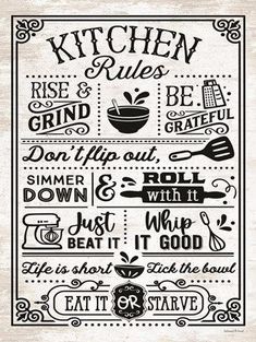 the kitchen rules poster is hanging on a wooden wall, with black and white lettering