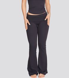 Introducing our newest addition - the REVEAL FOLD OVER LEGGINGS. Experience the perfect fusion of comfort and fashion with the fold over waist that provides support and a flattering silhouette. Featuring glute seams for a flattering fit and made from our signature soft, medium compression CONFIDENCE FABRIC, these leggings will take your workout wardrobe to the next level. Say goodbye to camel toe with the absence of a front groin seam and embrace tummy control with the cross-over waist style and Fold Over Leggings, Workout Wardrobe, The Fold, Slate Grey, New Tops, Fold Over, Camel, The Next, Confidence