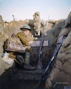 A Sentry of the 1/4th Battalion, East Lancashire Regiment in a sap-head at Givenchy-lès-la-Bassée, Pas-de-Calais, France, 28 January 1918. Note a camouflaged periscope. A 'Listening Post' also commonly referred to as a 'sap-head', was a shallow, narrow, often disguised position somewhat in advance of the front trench line - that is, in No Man's Land. 1/4th Battalion August 1914 : in Blackburn. Part of East Lancashire Brigade in East Lancashire Division. Moved on mobilisation to Chesham Fold ... Historical Pictures, Commonwealth