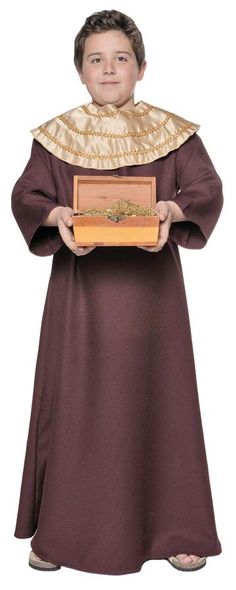 a young boy wearing a priest's robe and holding a wooden box