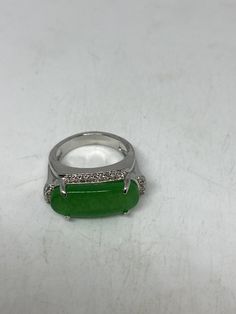 Vintage Lucky Green Nephrite Jade ring Large green nephrite jade Ornate German Silver Vintage ring, does not tarnish, NOT sterling Size 7 only My jeweler can custom re size for a $10-$20 fee All rings are shipped free in the US in a nice gift box. Check out our over a THOUSAND great reviews Engraving is $4 per letter and is not always perfect depending on the piece. It can take a few days if the jeweler is busy. This is payable to Paypal Judithsltd@gmail.com Formal Green Ring With Large Stone, Green Jade Jewelry With Large Stone, Green Oval Rings With Large Stone, Green Oval Ring With Large Stone, Oval Green Ring With Large Stone, Green Stone Fine Jewelry Rings, Green Oval Rings With Stone Setting, Green Oval Stone Setting Rings, Green Round Rings With Stones