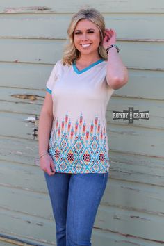 Get ready to fall in love with our Tupelo Tee! Featuring a cute aztec print and a comfortable v-neck, this tee is not only stylish but also true to size. Perfect for any occasion, you'll want to wear it every day. Don't miss out on this must-have wardrobe staple! 95% Polyester & 5% Spandex Sizing chart is in the Pictures Cheap Fitted Western Style T-shirt, Cheap Western Style Short Sleeve T-shirt, Cheap Western Style T-shirt For Rodeo, Country Style Short Sleeve T-shirt For Rodeo, Graphic Print Short Sleeve T-shirt For Rodeo, Fly Outfit, Wild Rag, Aztec Print, Trinidad And Tobago