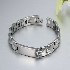 Overview: 100% new design and high quality Must-have for fashion women Have a beautiful appearance Specifications: Material: titanium steel Processing technology: gemstone Type: Bracelet Style: Unisex Shape: geometric Color: steel color width 7MM, black width 8mm Popular element: metal Package Content: Couple bracelet*1 Size Information: Magnetic Metal Bracelet Jewelry, Modern Gunmetal Jewelry With Bracelet Strap, Modern Gunmetal Jewelry With Stainless Steel Clasp, Modern Black Alloy Jewelry, Modern Silver Tungsten Carbide Jewelry, Modern Magnetic Jewelry For Gifts, Modern Magnetic Bracelet Jewelry, Adjustable Magnetic Minimalist Jewelry, Minimalist Magnetic Adjustable Jewelry