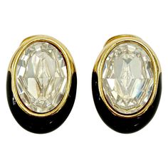 Swarovski beautiful gold plated and black enamel clip on earrings, set with lovely oval faceted crystals. Length 2.4cm / .94 inches by width 1.7cm / .67 inch. The earrings are in very good condition, and will arrive in their original box. These elegant vintage earrings are perfect for everyday or evening wear. Luxury Oval Clip-on Earrings As Gift, Luxury Oval Hallmarked Clip-on Earrings, Luxury Oval Vintage Clip-on Earrings, Luxury Oval Clip-on Earrings With Polished Finish, Faceted Crystal, Black Enamel, Earrings Set, Vintage Earrings, Evening Wear