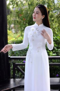 🌿 This set includes traditional Ao Dai, pants. Style: Traditional Material: Very well made with high-quality silk Collar: traditional collar Please provide bust-waist-and hip measurements when placing your order to ensure the best fit for you. 🌿 NOTE: * Recommend gentle washing * Please contact us for any inquiries about size. We don't have an exchange policy for the wrong size * It is safe for a washer and dryer in a "delicate" setting. * Actual Ao Dai colors may differ up to 10% due to light Embroidered White Ao Dai For Spring, Traditional White Embroidered Ao Dai, Traditional White Long Ao Dai, Traditional White Long Sleeve Ao Dai, Summer Long-sleeve Ao Dai With Floral Embroidery, Asian Dresses, Chalk Pens, Floral Ribbon, Pants Style