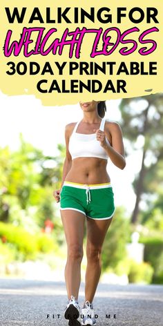 a woman in green and white shorts is walking down the street