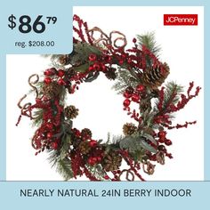 a christmas wreath with red berries and pine cones is on sale for $ 86 99