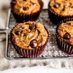 several chocolate chip muffins on a cooling rack