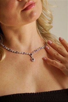 Stunning exclusive 925 sterling silver set, 14 carat white gold.  Main stone: magnificent natural Uruguayan amethyst 5.0x3.0 and 6.0x4.0 mm.  Additional stone: cubic zirconia of classic diamond cut. Necklace.  Front part: 230.0x30.0 mm.  Weight: 14.92g.  Circumference: 45 cm + extension chain.  Earrings.  Front part: 23.0 x 15.0 mm.  Weight: 5.87 g.  Length: 2.5cm.  Cost: 500 euros. Elegant Amethyst Gemstones With Diamond Accents, Diamond White Cubic Zirconia Jewelry With Gemstone Accents, White Gold Cubic Zirconia Gemstones With Halo Setting, Elegant Purple Gemstones With Diamond Accents, Elegant Silver Diamond Gemstones, White Gold Jewelry With Gemstone Accents In Cubic Zirconia, Cubic Zirconia Gemstones With Diamond Accents In White Gold, White Gold Cubic Zirconia Gemstones With Diamond Accents, Elegant Amethyst Gemstones With Accent Stones