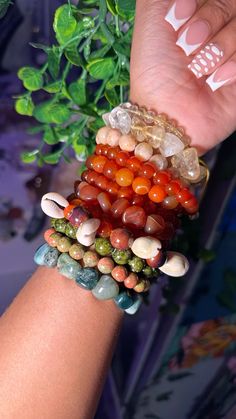 bracelets, bracelet stack, earthy jewelry, Earthy style, beaded jewelry, cowire shell, earthy black girl, boho black girl, chunky bracelets Crystal Bracelet Stack, Earthy Jewelry Aesthetic, Earthy Bracelets, Chunky Beaded Bracelets, Handmade Jewelry Diy Bracelets, Boho Bracelets Diy, Boho Beaded Bracelets, Afro Jewelry