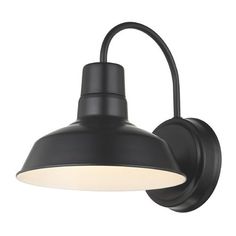 a black wall light with a white shade on the top and bottom half of it