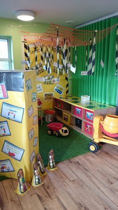 a child's playroom with toys and decorations