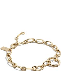 From COACH, this bracelet features:Refined open link bracelet BrassRound link accent at center adorned with engraved signature COACH logoAdjustable lobster clasp closureIncludes COACH pouchApprox. 7" L +1" extender; 0.2" W; 0.5" round link drop length; 0.1" DImported. Classic Adjustable Coach Bracelets, Classic Coach Adjustable Bracelets, Chic Coach Bracelets For Gift, Chic Gold Coach Bracelets, Chic Gold Coach Bracelet, Chic Coach Bracelet Jewelry, Chic Coach Bracelet, Bday Wishlist, April Birthday