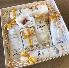 Dove female beauty products beautifully wrapped in white and gold  for Mother’s Day. Hampers For Mothers Day, Mother’s Day Gift Hampers, Bridal Gift Hamper Basket Ideas, Shadi Gift Baskets, Dove Basket Ideas, Cute Hamper Ideas, Dove Gift Basket Ideas, Gift Wrapping For Wedding, Shaadi Gift Basket