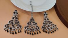 Black Kundan Maang Tikka and Jhumka Set | Tikka and Earring Set |  CZ AD black earrings mangtika - Free Delivery Making Time 10-15 Days In Personal trust me this is so much beautiful and in great quality nath, video call also available too see our products. These Celebrity Inspired Jhumka Earrings Are A Perfect Accessory This Wedding Season. Secured with a post and back Handcrafted To Perfection Perfect For Indian Weddings And Celebrations A Beautiful & Memorable Gift for Weddings and Special Occasions Fashion Empire Studio gives you new look, Made of high quality material(s).  This is very Designer Long Jhumki , Its A Choice Of Many Bollywood Celebrities.  Trust me, it is more Beautiful in Real another the Picture  This beautiful Set which is light in weight. The stones used are of high q Traditional Black Jewelry Sets For Festivals, Black Jewelry Sets For Festivals, Traditional Black Jewelry Sets For Festive Occasions, Black Jewelry Sets For Festive Occasions, Black Chandbali Jewelry For Diwali, Black Temple Jewelry Sets For Wedding, Festive Black Jewelry Sets For Gifts, Black Bollywood Jewelry For Diwali, Bollywood Black Jewelry For Diwali