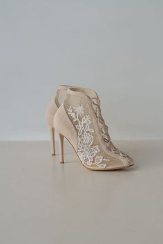 Wedding shoes 'Flower Laces' are handcrafted from soft Italian suede with handmade embroidery on the soft mesh. Romantic boots with a peep toe and lace-up down the front on a pointy heel. They are decorated with lace embroidery with sprigs of blooming flowers. Thanks to the adjustable lacing, this pair will fit any width. Inside there is a soft memory foam insole, which gives a feeling of additional comfort when walking. Tunit outsole is made of a mixture of leather chips and rubber, it's more w Wedding Heels With Pearl Embroidery And Open Toe, White Embroidered Round Toe Heels, Wedding Heels With Pearl Embroidery, Pearl Embroidered Heels For Wedding, Elegant Embroidered Wedding Shoes For Spring, High Heel Wedding Shoes With Pearl Embroidery, Elegant Heels With Floral Embroidery And Round Toe, White Floral Embroidered Closed Toe Heels, Elegant Floral Embroidery Round Toe Heels