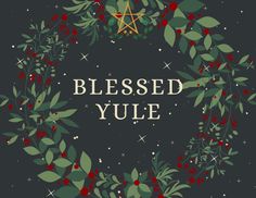 a christmas wreath with the words, blessed yule