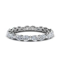 This 2.70 Ct. Diamond Eternity Band elegantly features a fine sequence of magnificent pear shaped diamonds with immense sparkle arranged beautifully in a classic basket prong setting on the delicate band offering you added finesse and splendor.  Pear cut stones of 2.70 Total Carat Weight with Clarity VS2 and Color G in a prong setting. Total Number of Stones:- 18 This 2.70 Ct. pear diamond eternity band is also available with your liking of precious metals. The eternity band shown is customized as per ring size 7, the carat weight and diamonds will differ slightly as per ring size selected. This charismatic diamond band is available from ring size 4 to 9. The diamonds in this eternity band are as per the ring size 7. Free Shipping Within USA. Direct manufacturing prices. 30 Days Luxury Diamond White Eternity Band With Diamond Accents, Luxury White Gold Eternity Band With Diamond Accents, Luxury Timeless Diamond White Eternity Band, Luxury Timeless White Eternity Band, Timeless Luxury White Eternity Band, Rings Bands, Diamond Eternity Band, Simple Diamonds, Platinum Metal