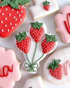 cookies decorated with fondant and decorated strawberries