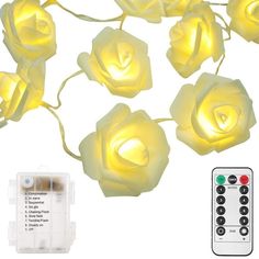 several yellow roses are lit up with lights and remotes next to each other on a white background