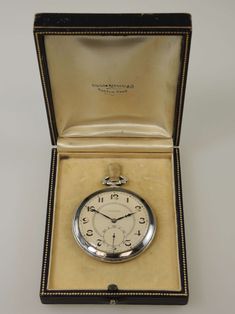 "This is a Swiss made pocket watch produced by the Longines pocket watch company circa 1925 Movement - the nickel ¾ plate movement has a lever escapement and 15 Jewels. The movement is signed \"Longines\" # 4424398 and is in 95% mint condition Case - the movement comes in a silver open face case, which has a snap on back and bezel. The case is signed \"Longines\" 4424398. The case has a border of black niello enamel on the back and front edges. The rest of the case has a smooth plain finish and Timeless Compact Pocket Watch With Chronometer, Timeless Self-winding Pocket Watch For Collectors, Timeless Formal Pocket Watch With Locket, Timeless Pocket Watch With Stopwatch Feature As Gift, Antique Formal Watches With Stopwatch, Antique Chronometer Pocket Watch For Formal Occasions, Antique Pocket Watch With Chronometer For Formal Occasions, Antique Pocket Watch With Chronometer For Formal Events, Antique Self-winding Pocket Watch With Round Dial