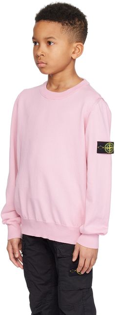 12 gauge knit organic cotton sweater. · Rib knit crewneck, hem, and cuffs · Pinched seam at armscyes · Detachable felted logo patch at sleeve · Machine-wash Supplier color: Pink Supplier code: 8016501B2 Model measures 53” / 134.6 cm tall and wears size 10Y. Stone Island Junior Size : child's height 2Y: 36 / 92 cm 3Y: 38.5 / 98 cm 4Y: 41 / 104 cm 5Y: 43.5 / 110 cm 6Y: 45.5 / 116 cm 8Y: 50.5 / 128 cm 10Y: 56 / 142 cm 12Y: 61.5 / 156 cm 14Y: 67 / 170 cm Winter Cotton Sweater With Logo Patch, Casual Winter Sweater With Logo Patch, Winter Crew Neck Sweatshirt With Logo Patch, Crew Neck Sweater With Logo Patch For Winter, Winter Crew Neck Sweater With Logo Patch, Stone Island Junior, Pink Crewneck, 12 Gauge, Knit Crewneck