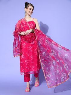 Flaunt your glam look when you step out donning this voguish kurta set. Tailored with an attractive square neck and calf length, this kurta set is a must-have. Kurta:Magenta colourAttractive square neckSleevelessCalf lengthOrganza, dry cleanTrousers:Solid trousersPartially elasticated waistCotton blend, dry cleanDupatta:Taping borderPrinted patternOrganza, Dry CleanSize & FitSize worn by the model: SChest: 32"Waist: 24"Hips: 36"Height: 5'8"Material & CareTop: OrganzaTop Inner: ShantunBottom: Cot Glam Look, Glam Looks, Kurta Set, Square Neck, Formal Dresses Long, Saree, Formal Dresses, Square, Floral