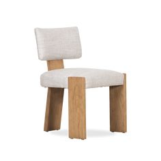 a white chair with wooden legs and a seat cushion on top of it, against a white background