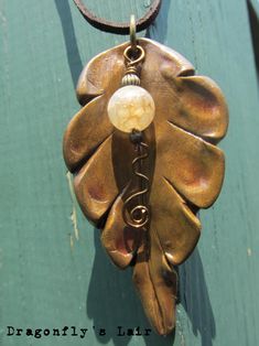 Red Pigment, Gingko Leaves, Brown Flats, African Turquoise, Suede Cord, Leaf Pendant, Agate Beads, Copper Wire, Agate