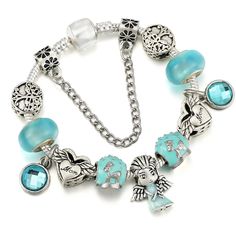 Blue Mom Angel Charm Bracelet. Weight About 40g Clasp Type Pandora Style. Length 19cm Turquoise Metal Charm Bracelet As Gift, Turquoise Metal Charm Bracelet Gift, Nickel-free Blue Charm Bracelet For Gift, Blue Nickel-free Charm Bracelet As Gift, Nickel-free Blue Charm Bracelet Gift, Blue Charm Bracelet Jewelry, Nickel-free Blue Sterling Silver Charm Bracelet, Blue Metal Charm Bracelet As Gift, Blue Nickel-free Crystal Bracelet For Gift