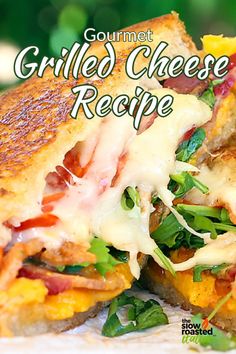 a grilled cheese sandwich with lettuce and bacon