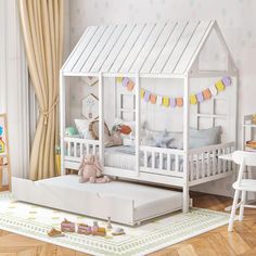 a child's bedroom with a white bed and toy house on the floor next to it