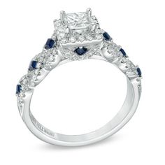 a diamond and blue sapphire engagement ring