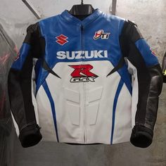 Description: SUZUKI MEN Motorbike Racing Leathers jacket is especially designed for professional bikers to fulfill their biking passion on track with great safety. This Jacket features excellent design & comfort, 100% genuine Cowhide leather, approved internal & external Protectors on Shoulder, Elbows and Back, YKK Zippers for Performance. Full ventilated Chest to keep the biker cool while riding (Optional). Available in all sizes, S,M,L,XL,XXL,XXXL & Custom Size. Safety Features: *External CE A White Biker Jacket For Winter Events, White Moto Outerwear For Streetwear, White Biker Outerwear For Biker Events, White Biker Style Outerwear For Biker Events, White Biker Jacket For Outdoor, White Fitted Biker Jacket For Biker Events, White Sporty Biker Jacket With Long Sleeves, Casual White Motorcycle Outerwear, White Sporty Long Sleeve Biker Jacket