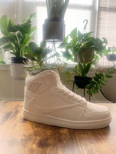 Enjoy this hand poured and individually crafted concrete sneaker inspired pot. These pots are multi functional for any space, and can be used for plants, writing utensils or as an eclectic art piece on your shelf. Travis Scott Jordan 1, Concrete Pots, Writing Utensils, Eclectic Art, Travis Scott, Hand Poured, Jordan 1, Labour Day, High Top Sneakers