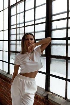 The RACHEL is your go-to basic cropped tee. This boxy tee features a classic crew neckline, tacked cuffed sleeve with a cropped relaxed fit with and a raw hem that sits above the natural waistline. You will be pairing this extra lux soft tee with everything in your closet. Basic White Cropped Shirt, Everyday White Cropped Top, Trendy White Cropped T-shirt For Loungewear, Trendy White Cropped T-shirt For Everyday, Everyday Boxy Fit Short Sleeve Crop Top, Everyday Boxy Fit Crop Top With Short Sleeves, White Cropped T-shirt For Summer In Athleisure Style, White Cropped T-shirt For Everyday Summer Wear, White Basic Cropped T-shirt