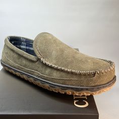 Keep It Cozy In The Denali Moccasin From Crown Vintage. The Leather Construction Provides A Lasting Add To The Cozy Wardrobe, While The Cushioned Footbed And Toasty Lining Ensure Comfort. Features Nubuck Leather Upper Slip-On Round Moc Toe Fabric Lining Cushioned Footbed Synthetic Treaded Sole Imported Casual Suede Outdoor Slippers, Casual Outdoor Suede Slippers, Casual Suede Moccasins For Outdoor, Casual Suede Slippers With Textured Sole, Casual Suede Moccasins For Winter, Casual Winter Moccasins With Rubber Sole, Casual Winter Suede Moccasins, Casual Closed Toe Loafers With Suede Lining, Casual Suede Lined Closed Toe Loafers