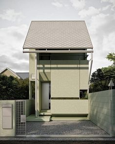 a small house with a white roof and windows