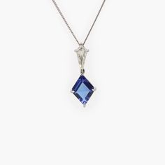 Necklace in 18ct white gold with a lozenges cut blue tanzanite gemstone with a kite cut diamond at the top of the pendant. The tanzanite gemstone has a carat weight of 2.29ct and is surrounded by four claws. The diamond is a kite cut with a carat weight of 0.50ct, diamond colour F and clarity VS. The pendant is suspended on 16"-18" 18ct white gold curb chain with a spring ring clasp. This is a bespoke piece where we originally had gemstones and made it into a necklace. 18ct white gold Blue tanza Jewel Art, 26 December, Size 12 Fashion, Gold Curb Chain, Gem Pendant, Shiny Rings, Delicate Jewellery, Infp Personality, Jewellery Art